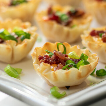 pimento cheese appetizer with more behind.