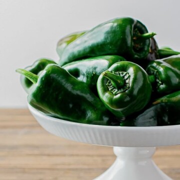 poblano peppers on white stand