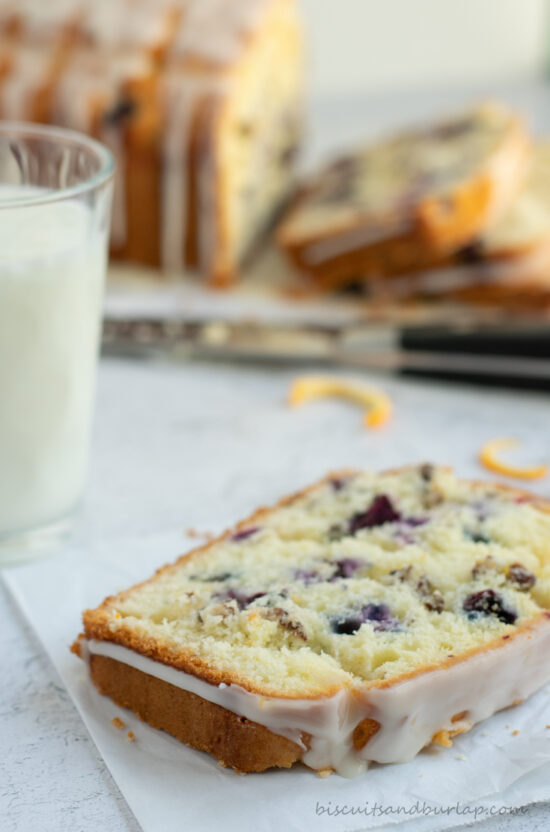 slice of blueberry orange bread with milk