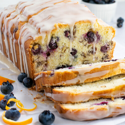 blueberry bread with several slices made.