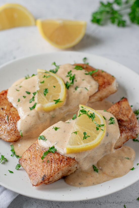 2 fish filets topped with cajun cream sauce