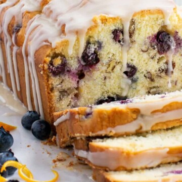 blueberry bread with several slices made.