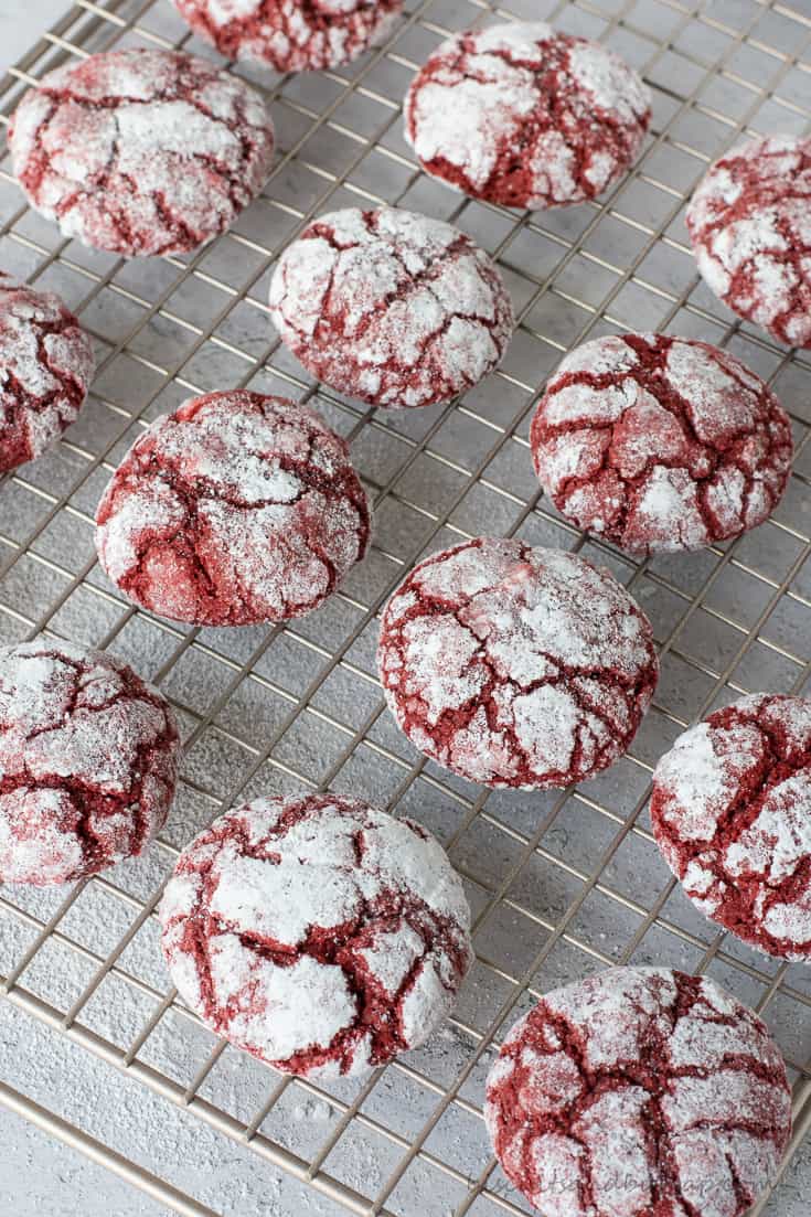 red velvet crinkle cookies on rack
