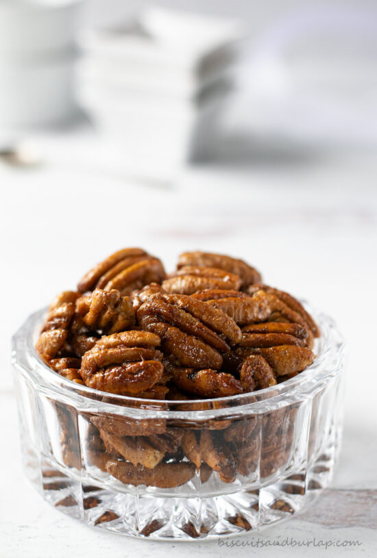 glass bowl with spiced pecans