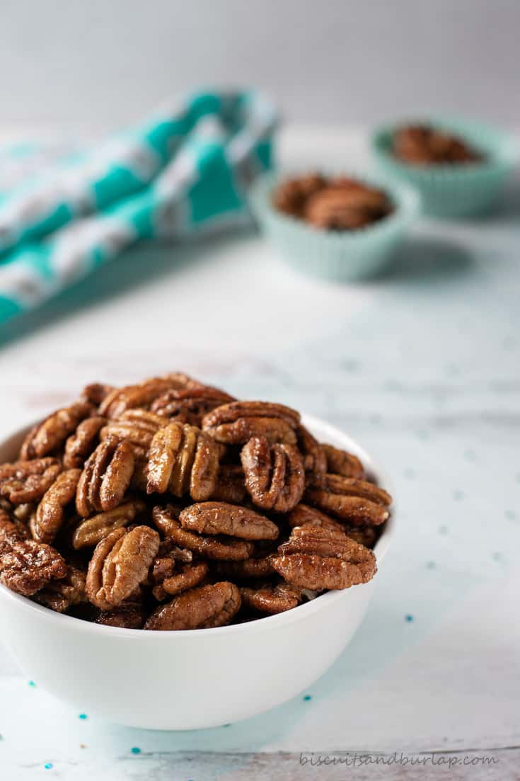 white bowl of spicy pecans