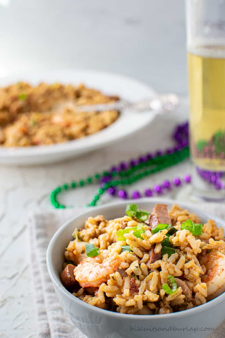 bowl of jambalaya with beer & beads