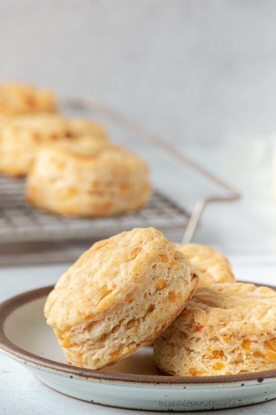 biscuits on small plate with more behind