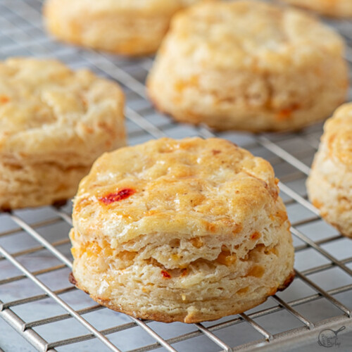 close up of pimento cheese biscuits on rack.