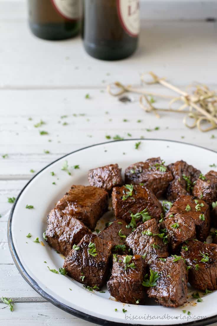 cajun steak bites on white plate