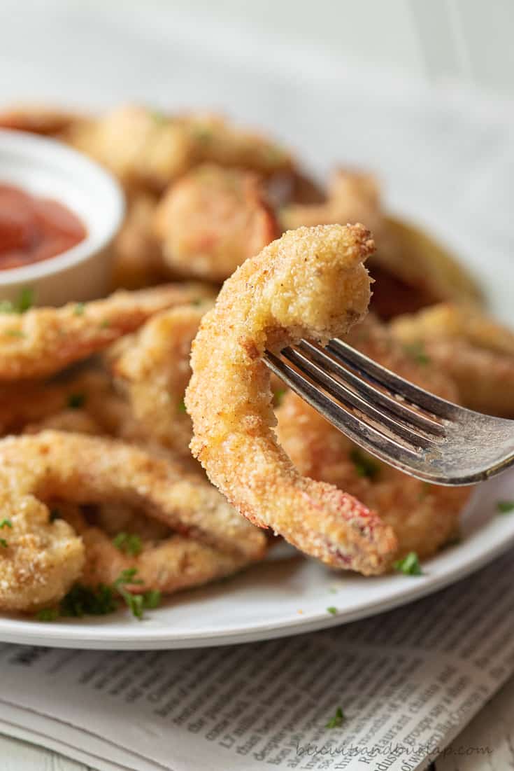 close up of air fryer breaded shrimp on fork