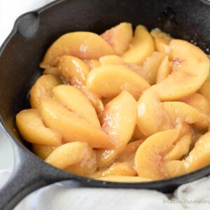 caramelized peaches in cast iron skillet.