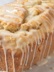 loaf of fresh peach bread with glaze.