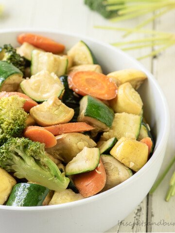 smoked vegetables in white bowl.