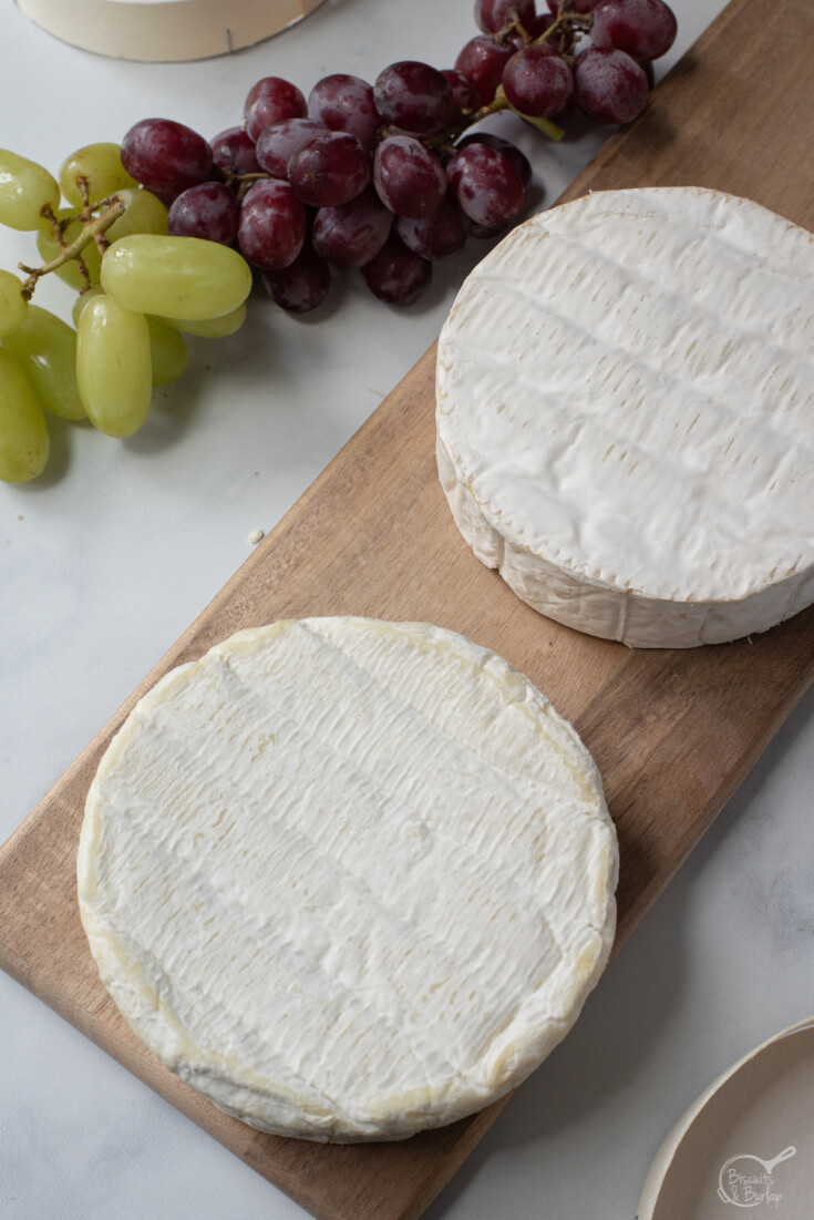 wheels of brie and camembert