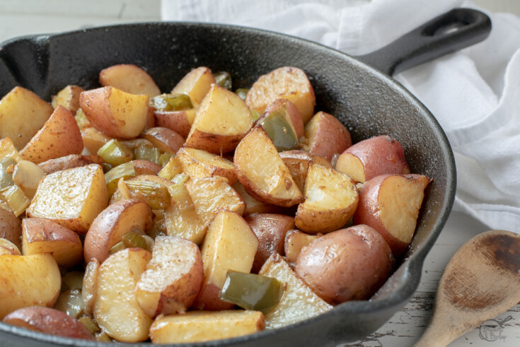 horizontal image of cajun oven roasted potatoes