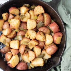 cajun roasted potatoes in cast iron skillet