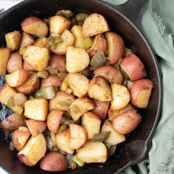 cajun roasted potatoes in cast iron skillet