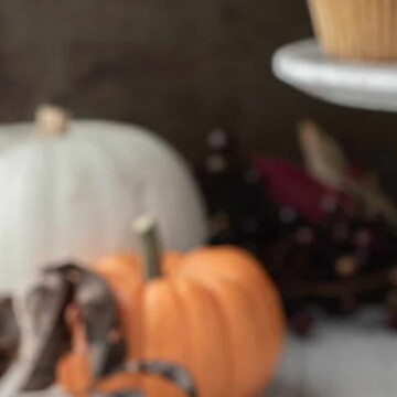sweet potato muffin with pumpkins behind