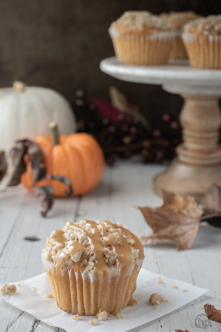 sweet potato muffin with pumpkins behind