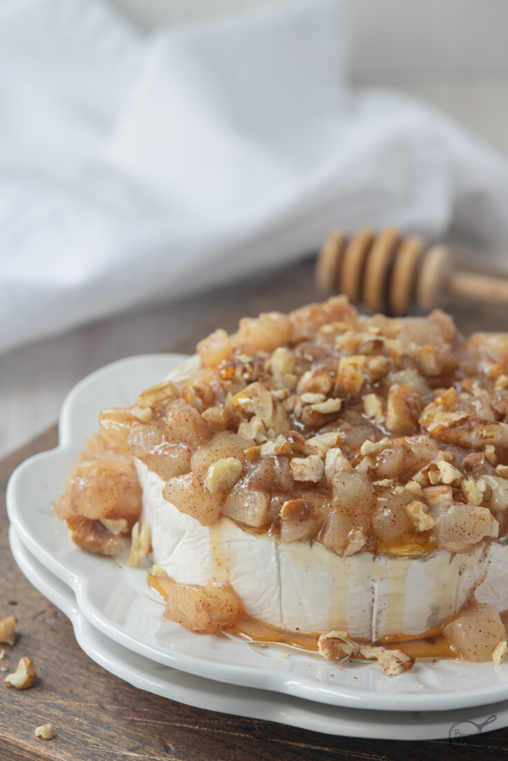 baked camembert with honey on plate