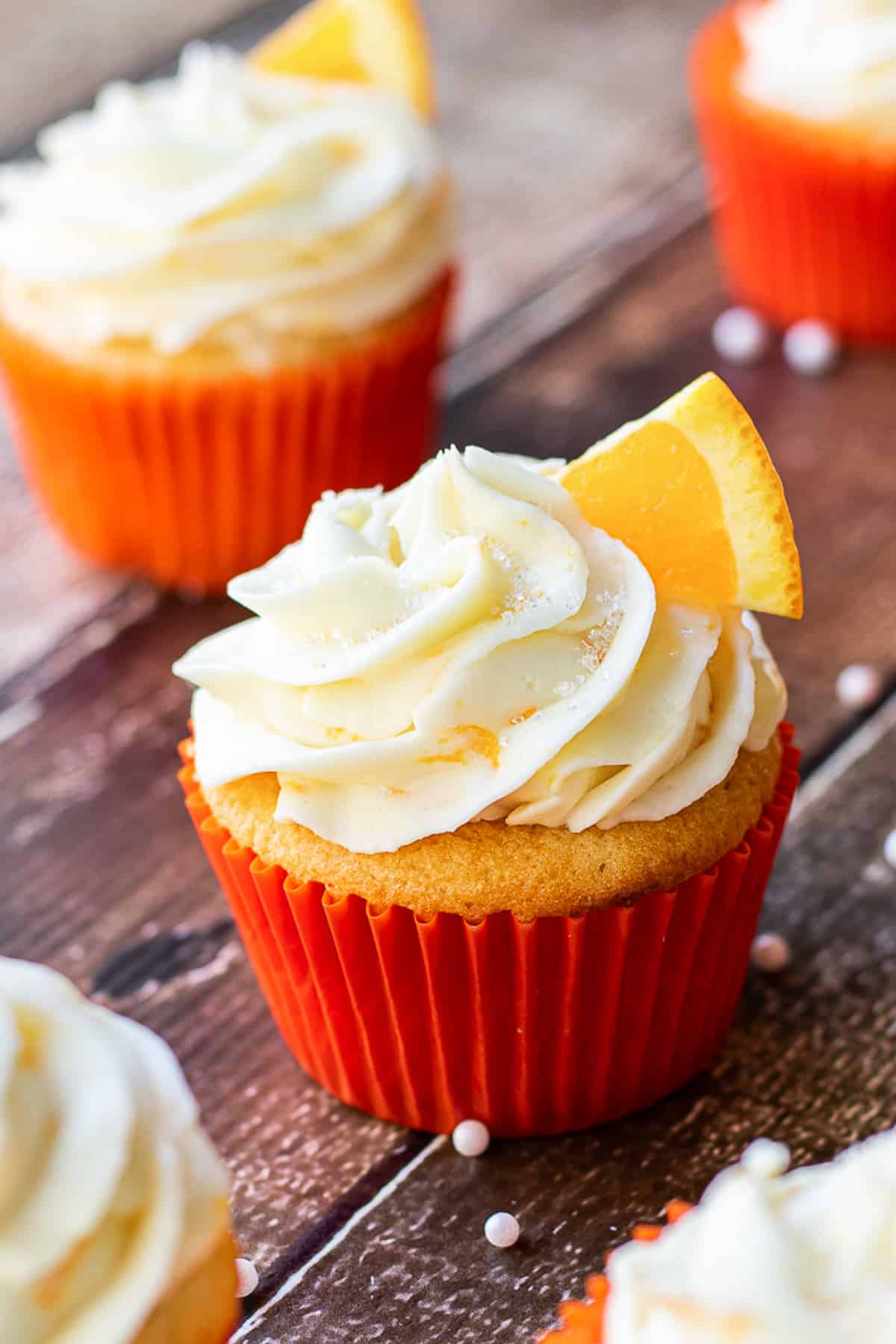 orange cupcake with others around