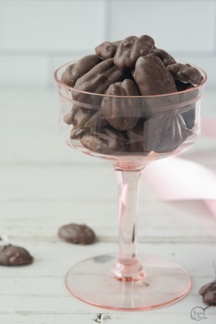 pretty pink glass filled with chocolate nuts