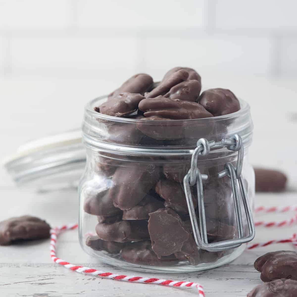 jar of milk chocolate covered pecans