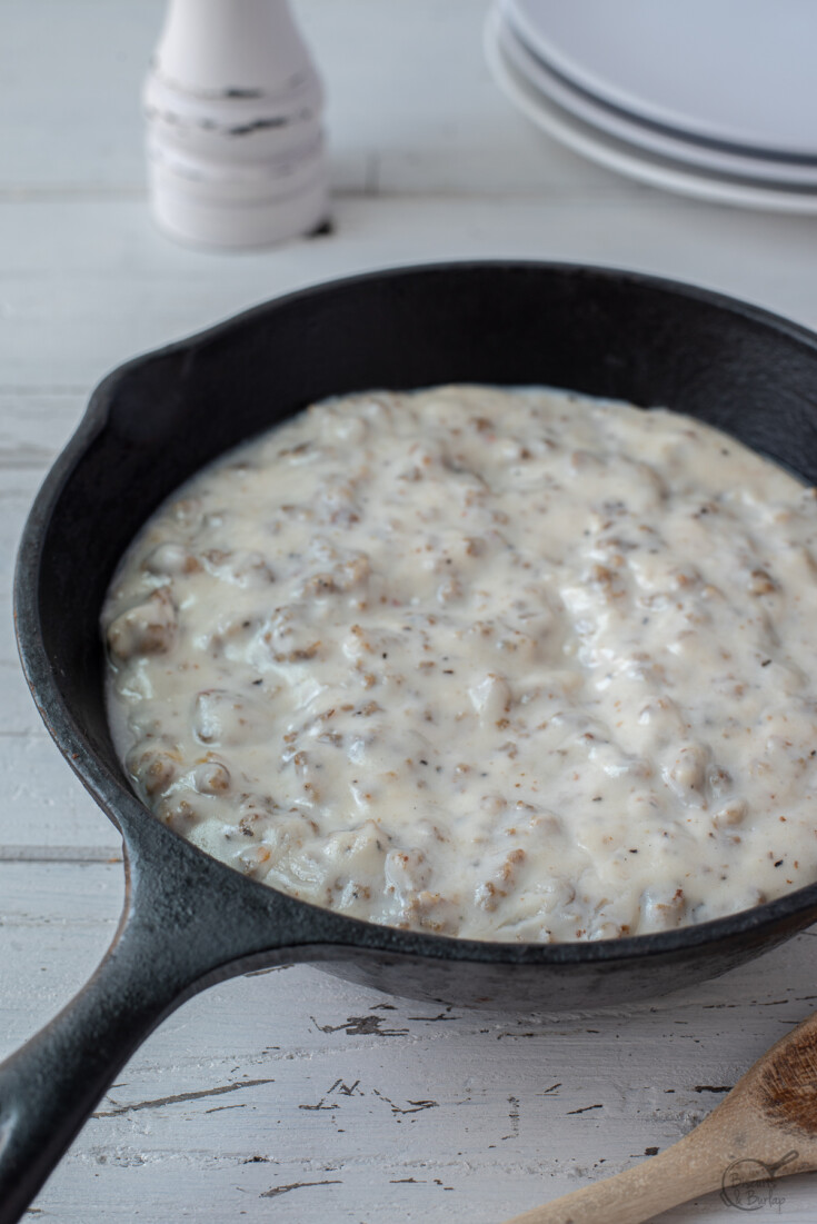 cast iron skilet full of sausage gravy