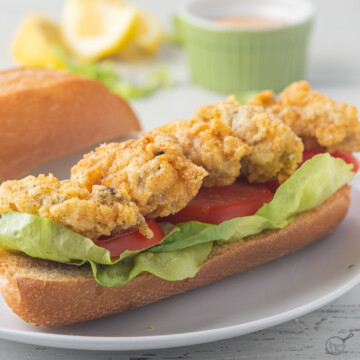 fried oyster po'boy on white plate square image