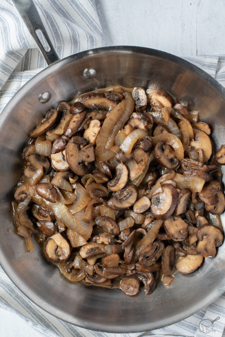 skillet of sauteed onions and mushrooms