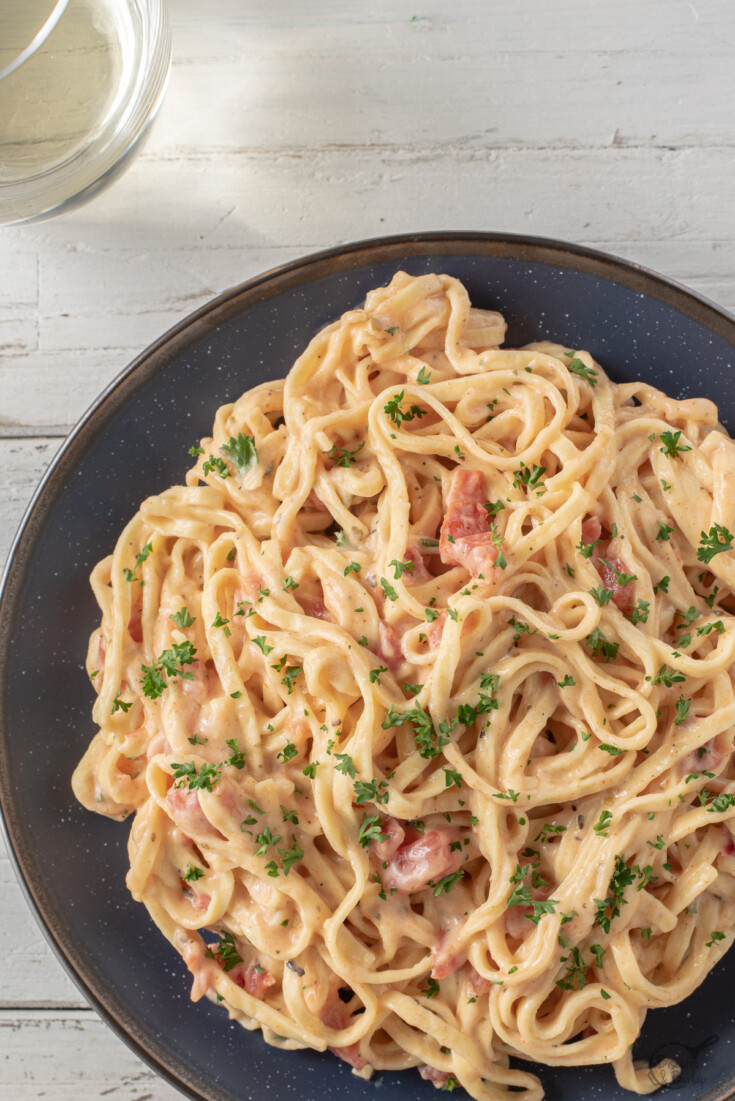 creole cream sauce with pasta on plate.