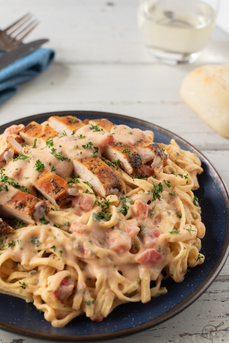 chicken over pasta with creole cream sauce.