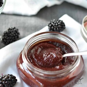 jar of blackberry bbq sauce with spoon.