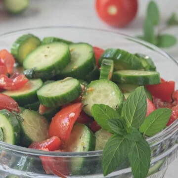 square image of Mediterranean cucumber salad in a bowl