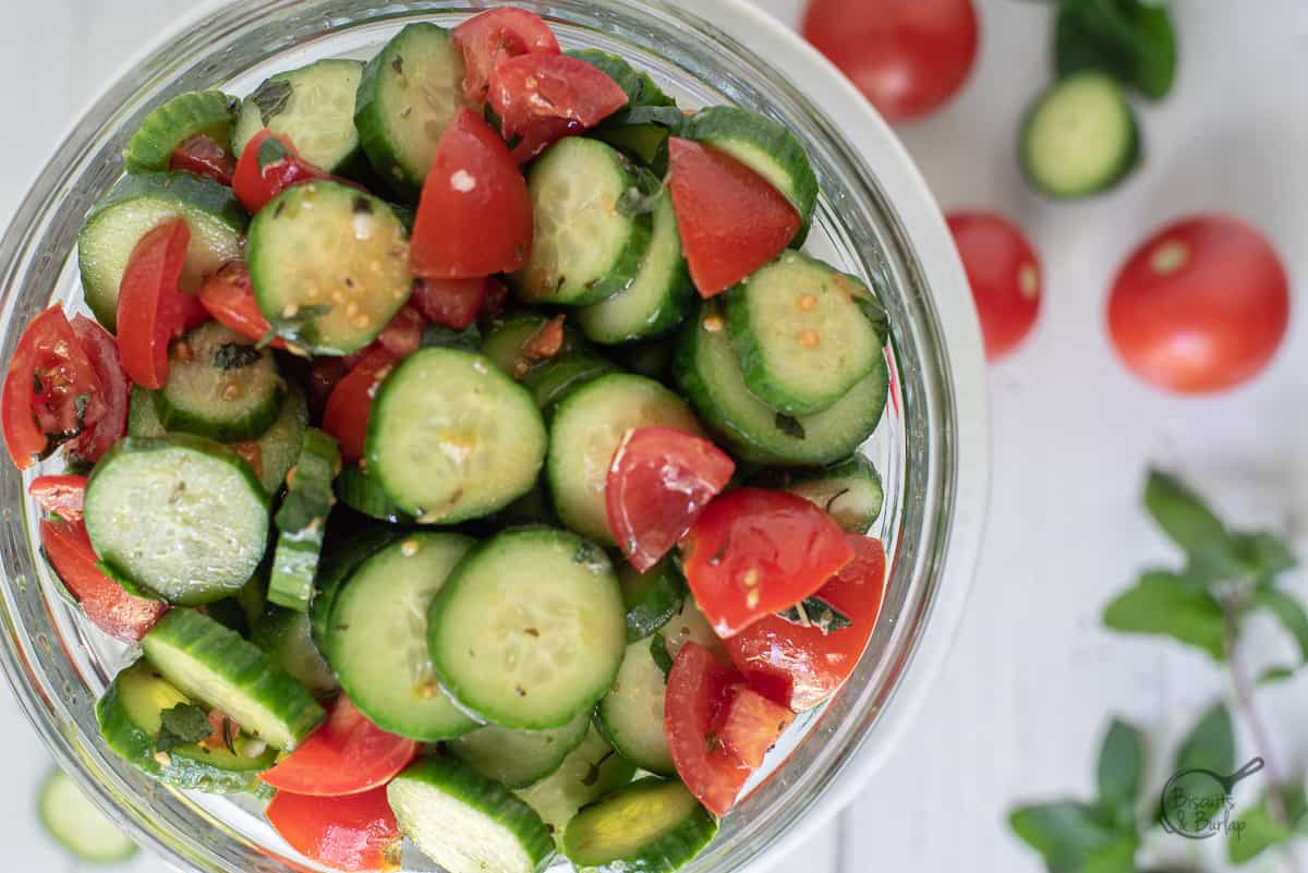 horizontal image of Mediterranean cucumber salad in a bowl