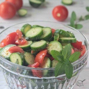 square image of Mediterranean cucumber salad in a bowl