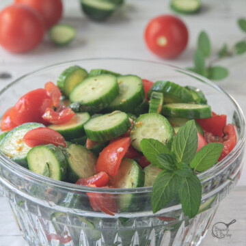 square image of Mediterranean cucumber salad in a bowl