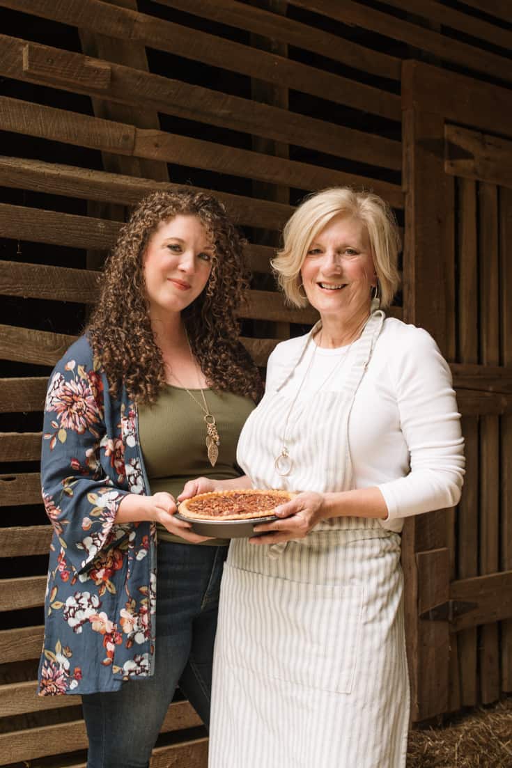 Pam and Sara holding pie