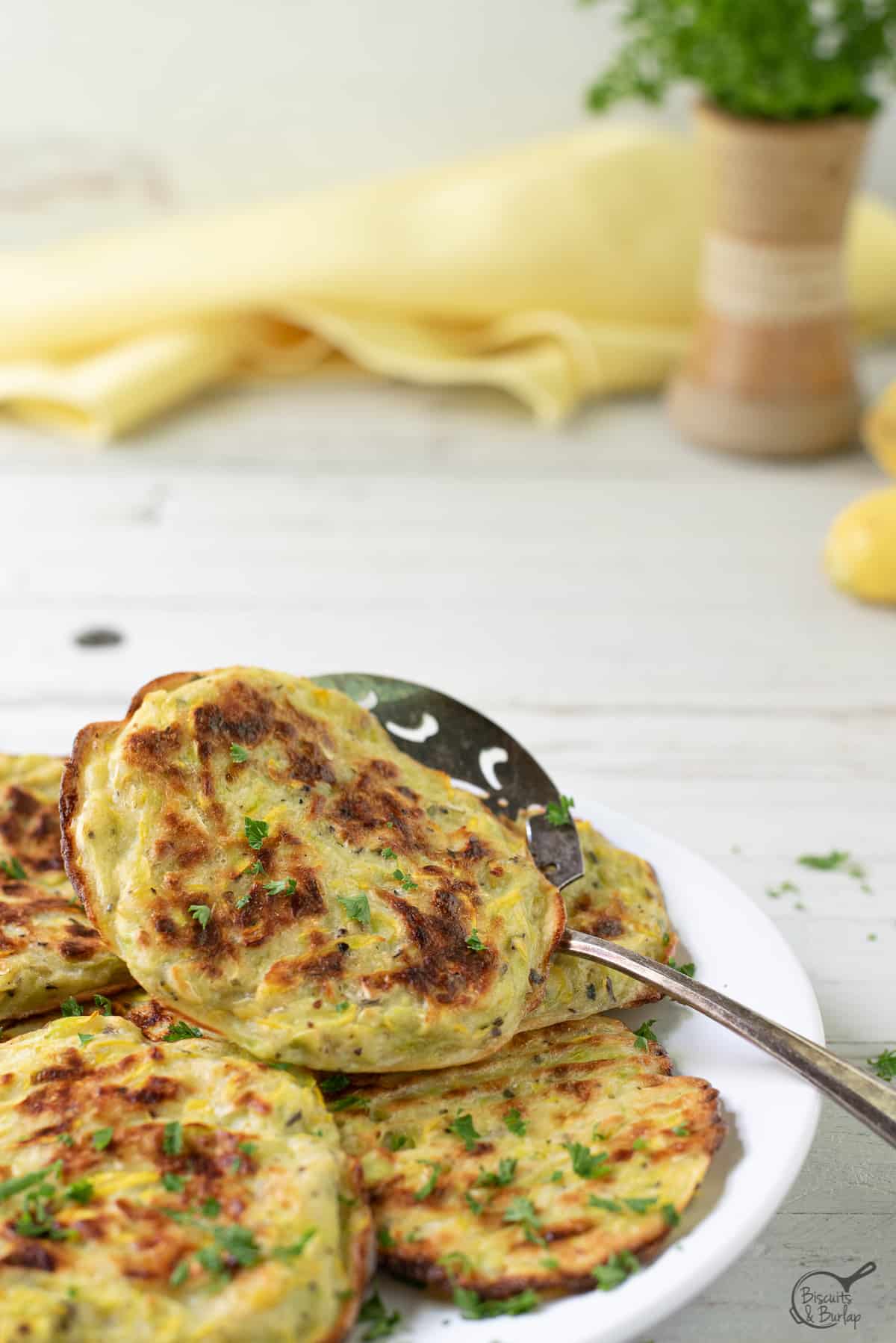 yellow squash fritters (squash patties) that have been oven baked.