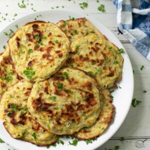 square image of yellow squash fritters.