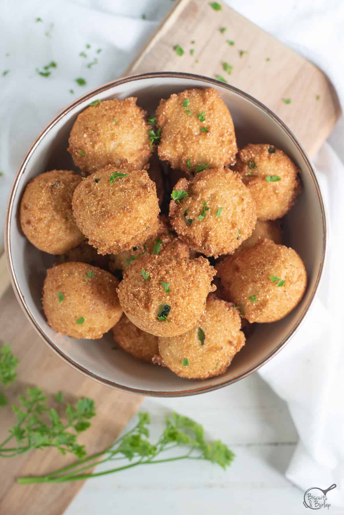 cajun hush puppies in bowl.