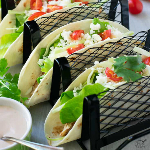square image of grilled fish tacos.