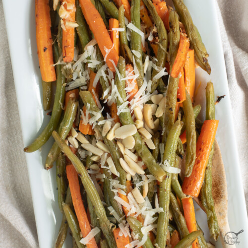 square image of roasted carrots and green beans