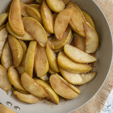 square image of cooked apples in bowl