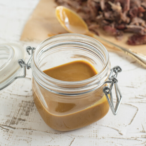 Georgia Mustard BBQ Sauce in a jar on white background