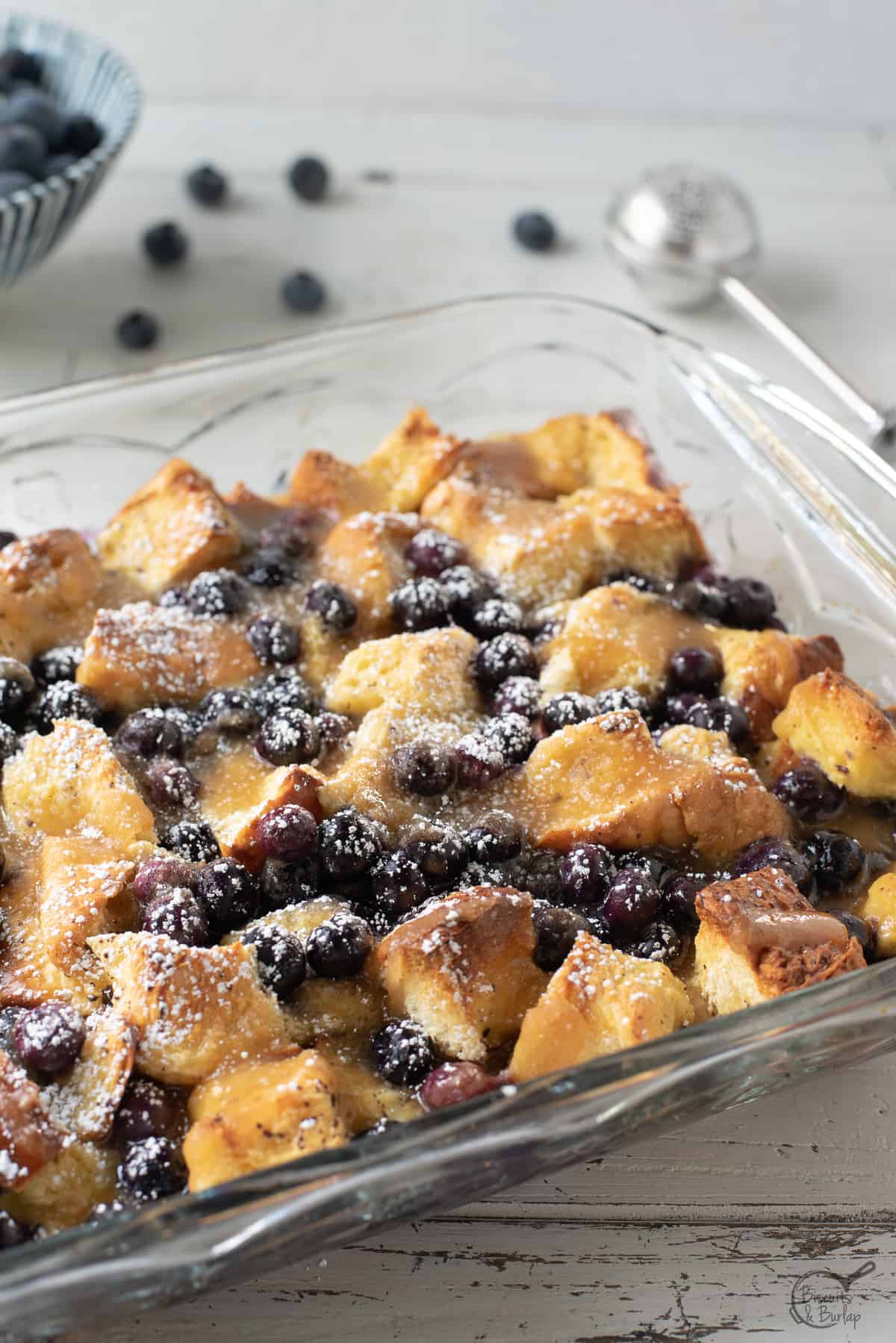 french toast casserole with powdered sugar on top. 
