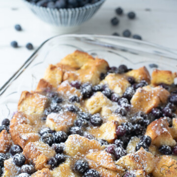 square image of french toast casserole with blueberries.