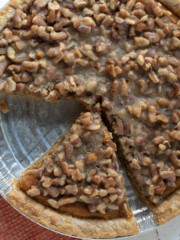 sweet potato praline pie with 1 slice missing