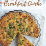 Crustless breakfast quiche with slice cut on white background with recipe title overlay