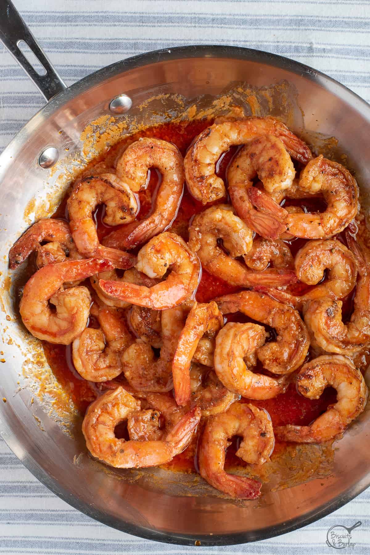 buffalo shrimp in skillet.
